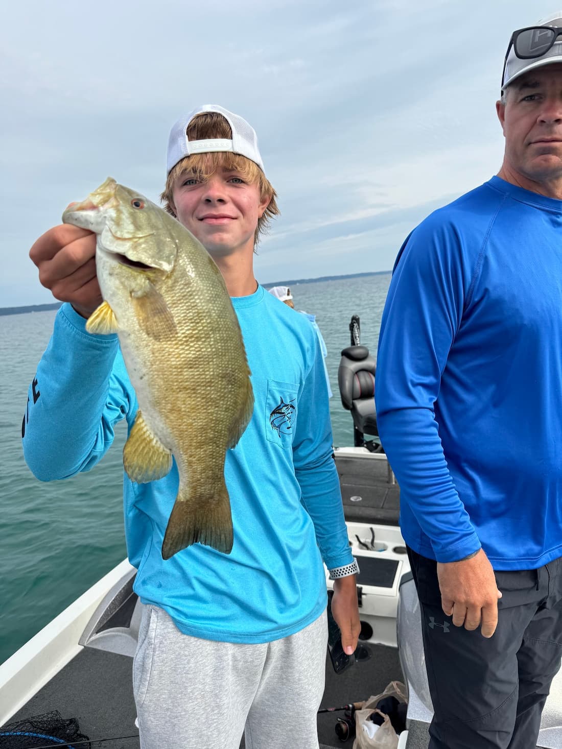Teen and dad with catch